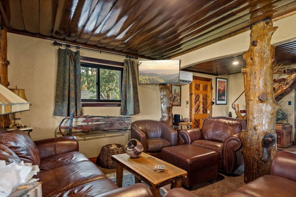 Watch a movie on the TV while enjoying the luxurious couches!