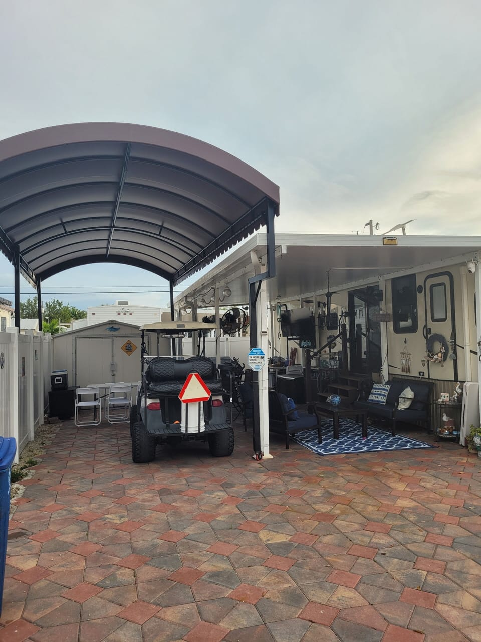  View of outdoor space and new carport