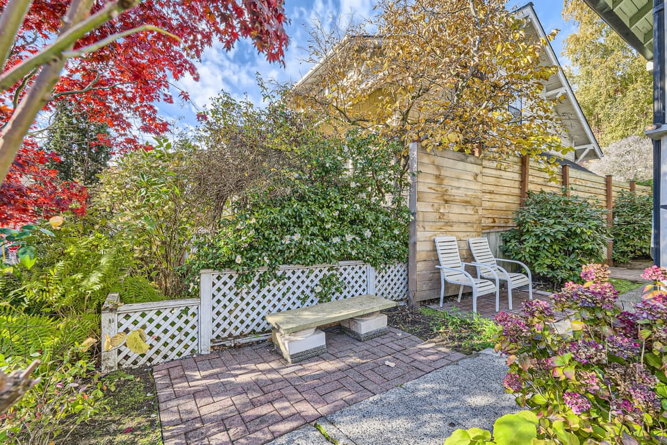 Yard with beautiful garden and outdoor furniture