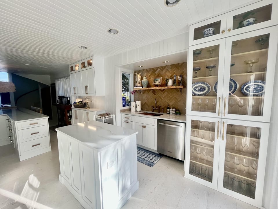 Custom Zellige tile, brass kitchen faucet
