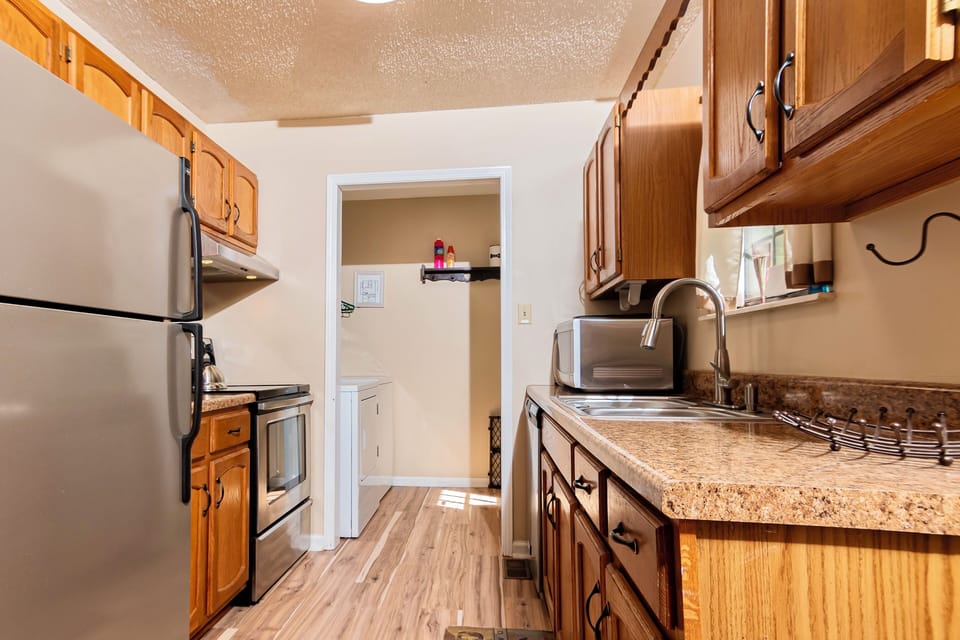 Fully stocked kitchen with Keurig coffee pot