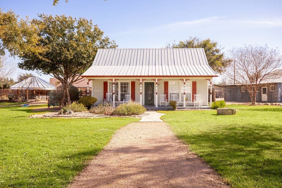 Step into The Ranch House, where history seamlessly meets comfort and country charm. It is the closest to The Oasis Pool.