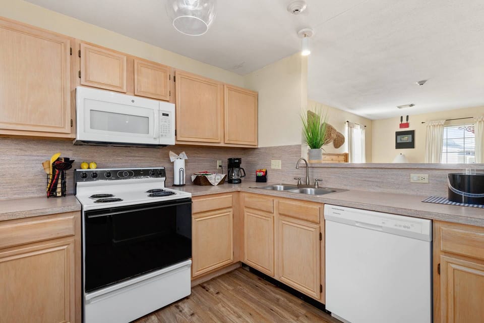 Indulge your culinary skills in the full-sized kitchen of The Ranch House, equipped with all the essentials and a convenient dishwasher.
