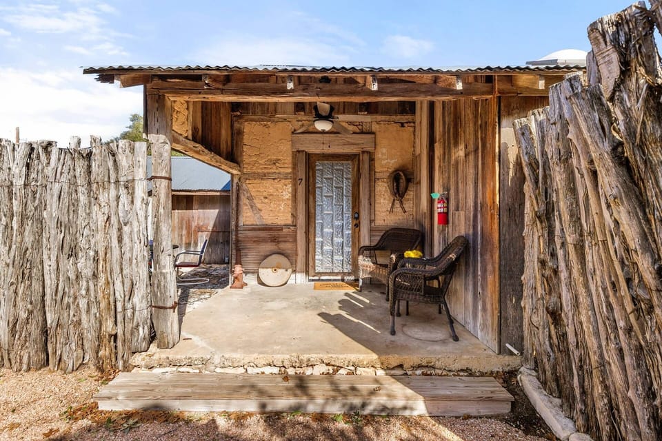 The private courtyard provides an intimate setting, while the patio conversation set invites you to relax and enjoy the serenity.