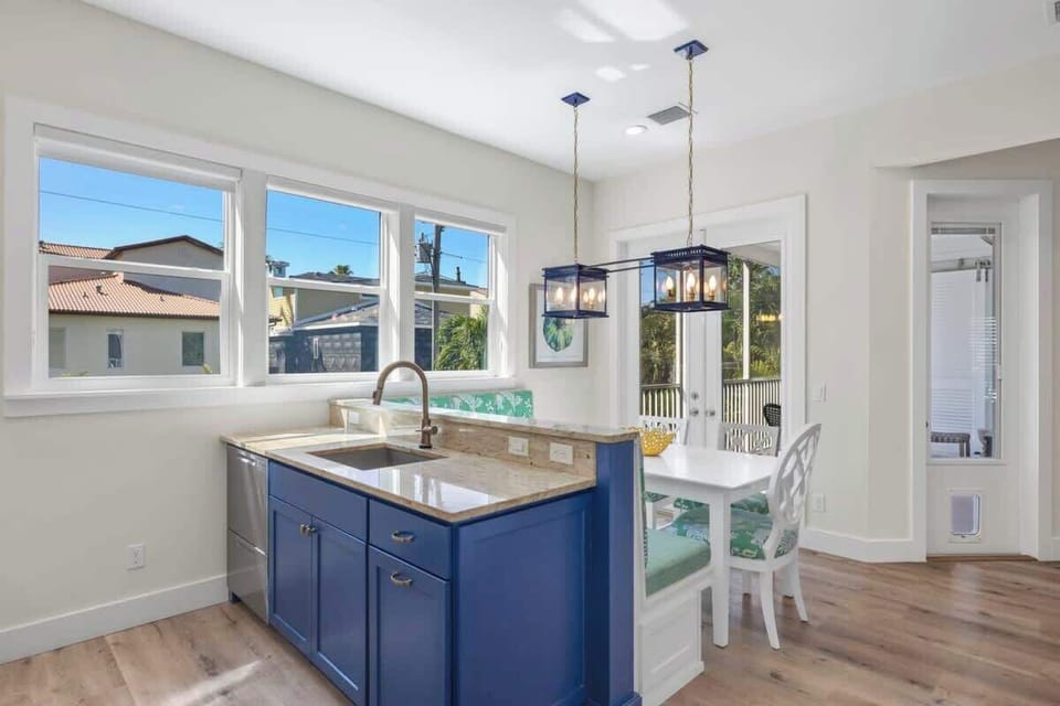 Gorgeous chef's kitchen with chic banquet