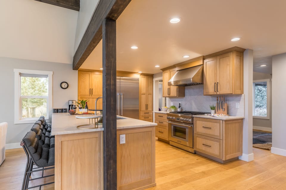 Fully equipped kitchen with a gas range.