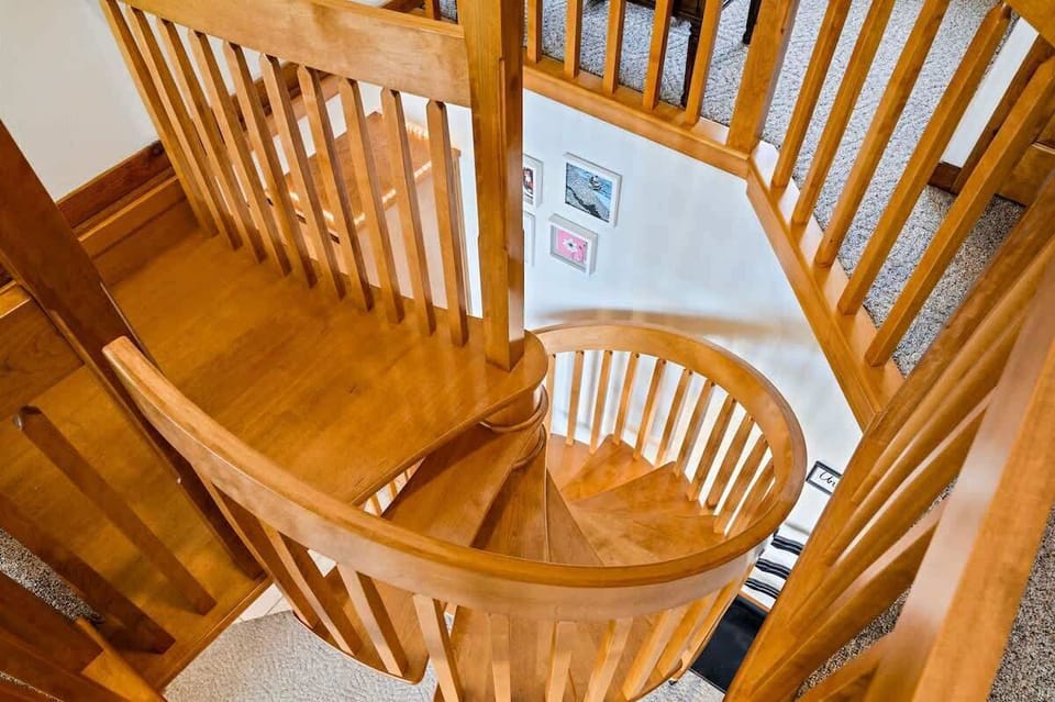 One of the standout features of this property is the sandy beach right out your back door. Build sandcastles with the kids, stroll along the shore, or kayak over to Cave Point County Park.