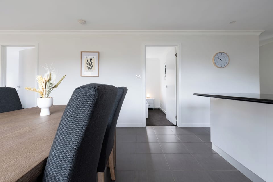 Wake up, grab a coffee, and start your day in this light-filled, beautifully designed open layout.