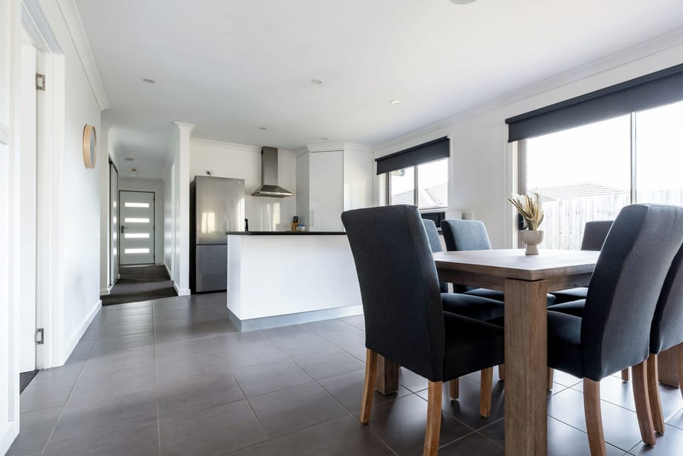 Make your way through to the open kitchen-dining-living space