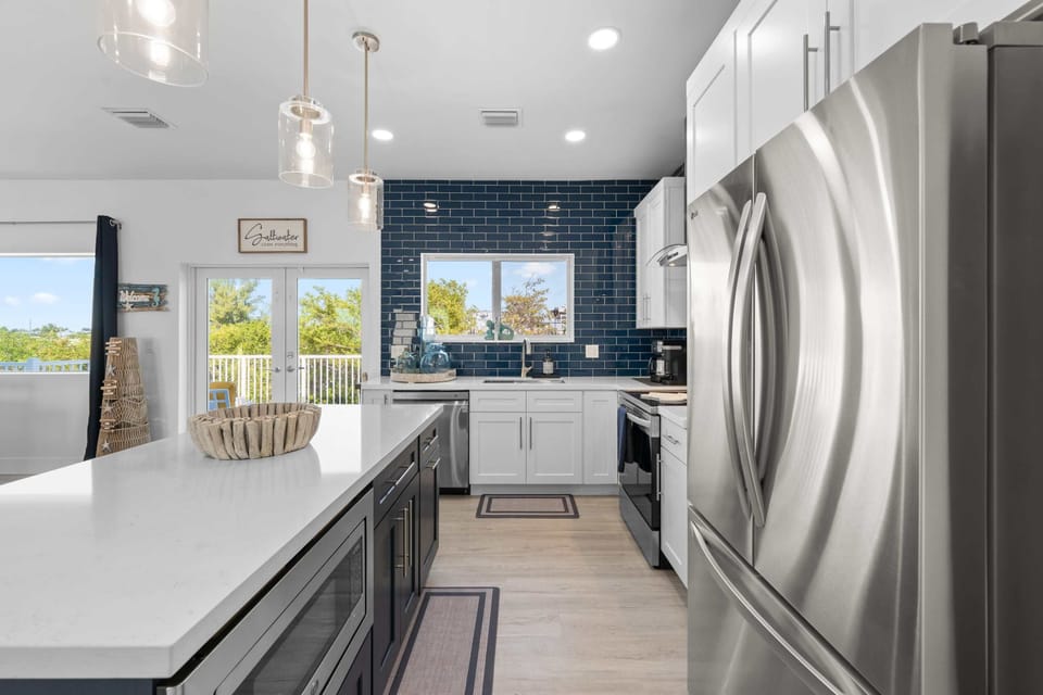 Experience the perfect blend of style and functionality in our contemporary kitchen.