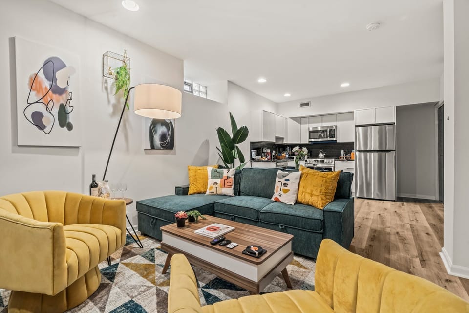 Every detail tells a story — from the art and lighting to the layered textures that make this space feel like home.