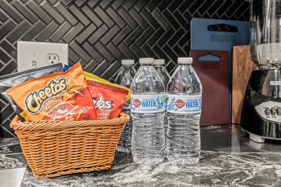 We’ve got your cravings covered—enjoy complimentary snacks and water upon arrival.
