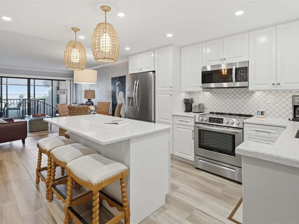 Kitchen and breakfast bar with waterview