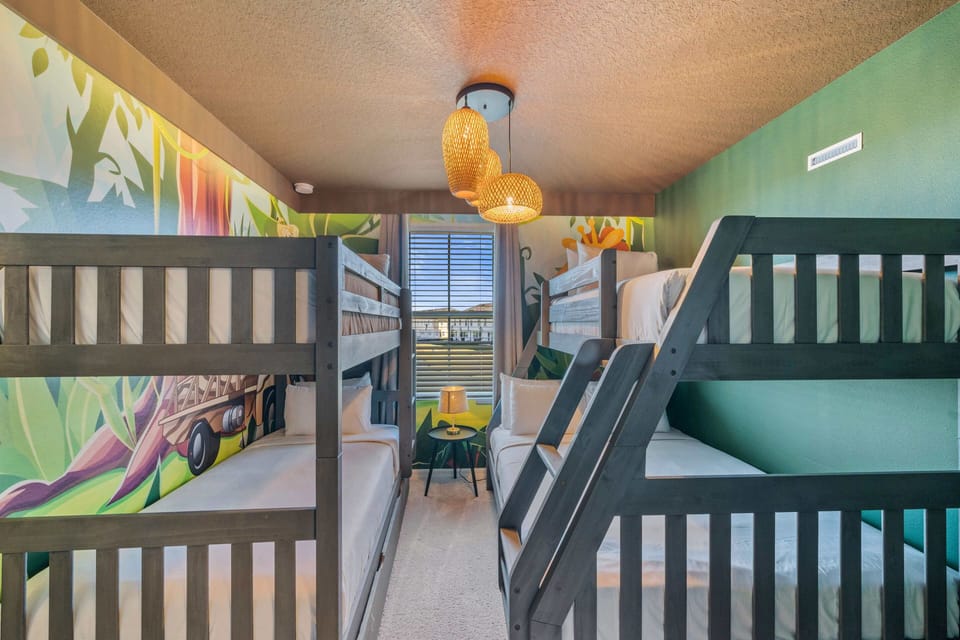 Safari Bedroom of the Townhouse in Davenport Florida - Offering three single size beds and one double size bed - Plenty of everyone to have a relaxing sleep