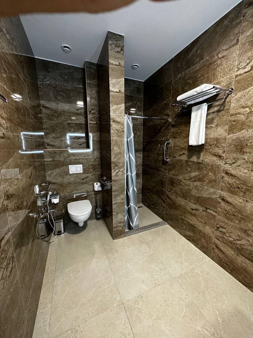 Shower, free toiletries, hair dryer, bathrobes