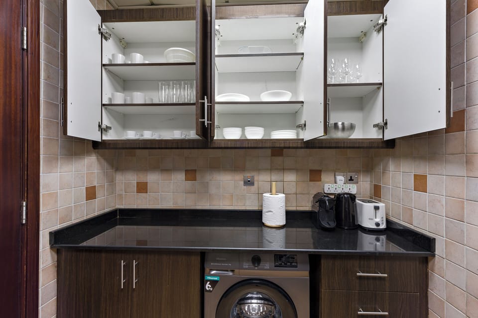 Grand Apartment | Private kitchen | Fridge, microwave, oven, stovetop