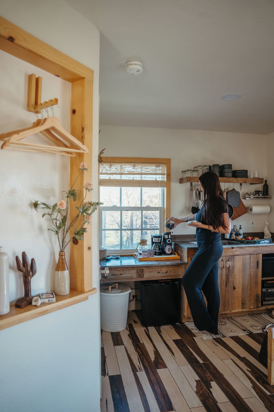 Sunny rustic kitchenette with espresso bar and chic wood accents.