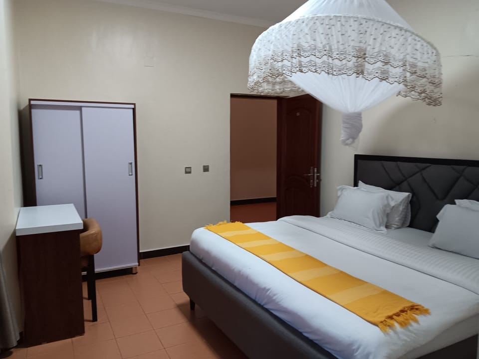 Executive Single Room | Blackout drapes, iron/ironing board (on request), WiFi (free)