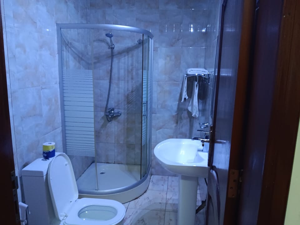 Basic Single Room | Blackout drapes, iron/ironing board (on request), WiFi (free)