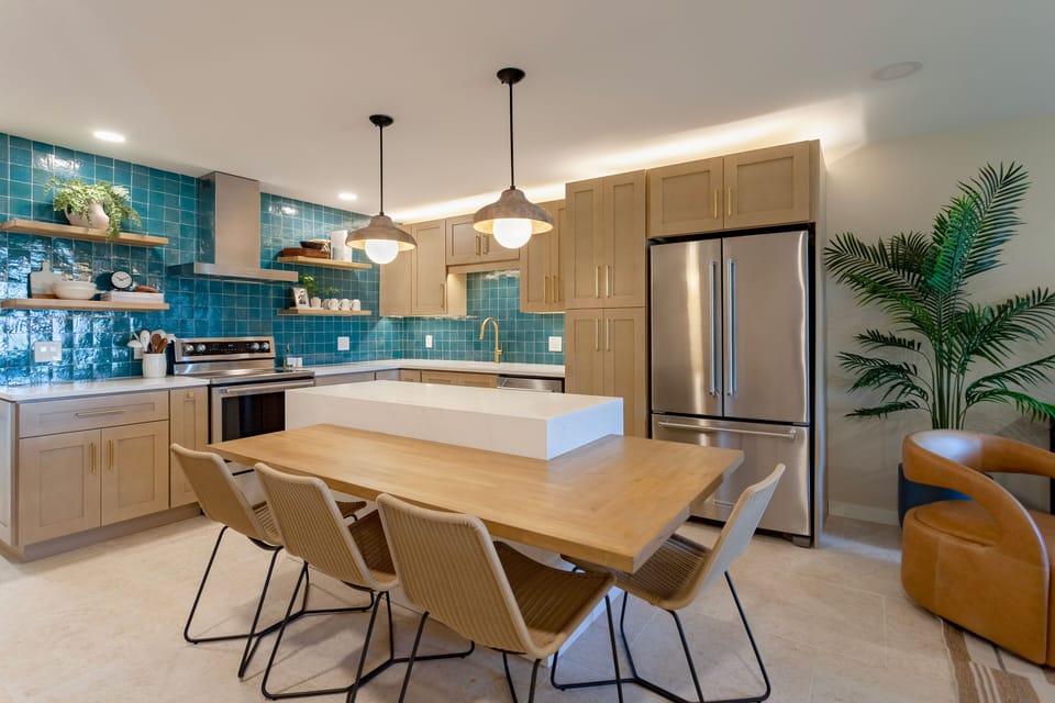 Kitchen with brand new fridge, range, oven, dishwasher, microwave and more.