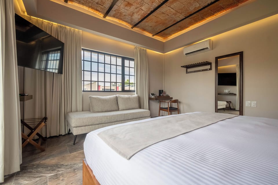 Luxury Double Room, 1 King Bed, City View | Living area | 50-inch Smart TV with cable channels, smart speakers