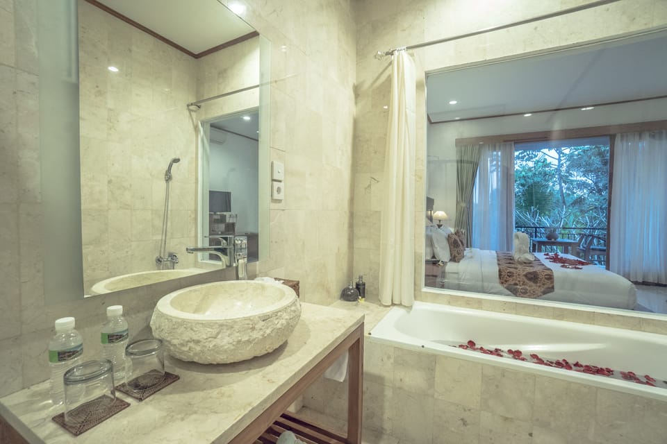 Separate tub and shower, hair dryer, towels