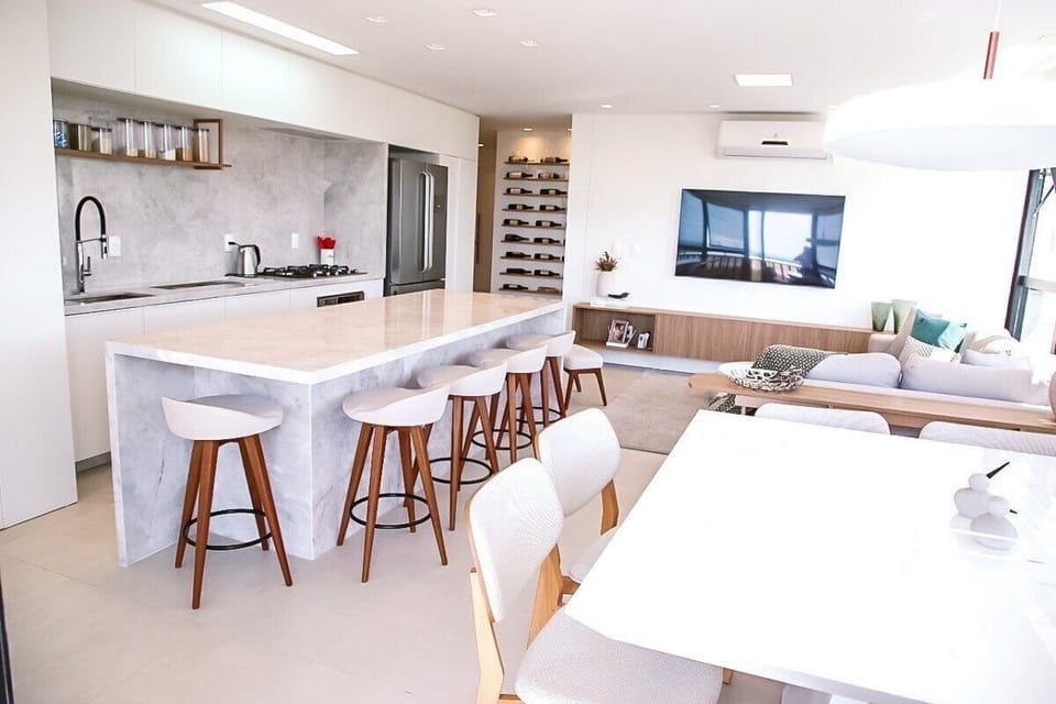 Deluxe Apartment, Pool Access, Beach View | Private kitchen | Fridge, microwave, cookware/dishes/utensils, dining tables