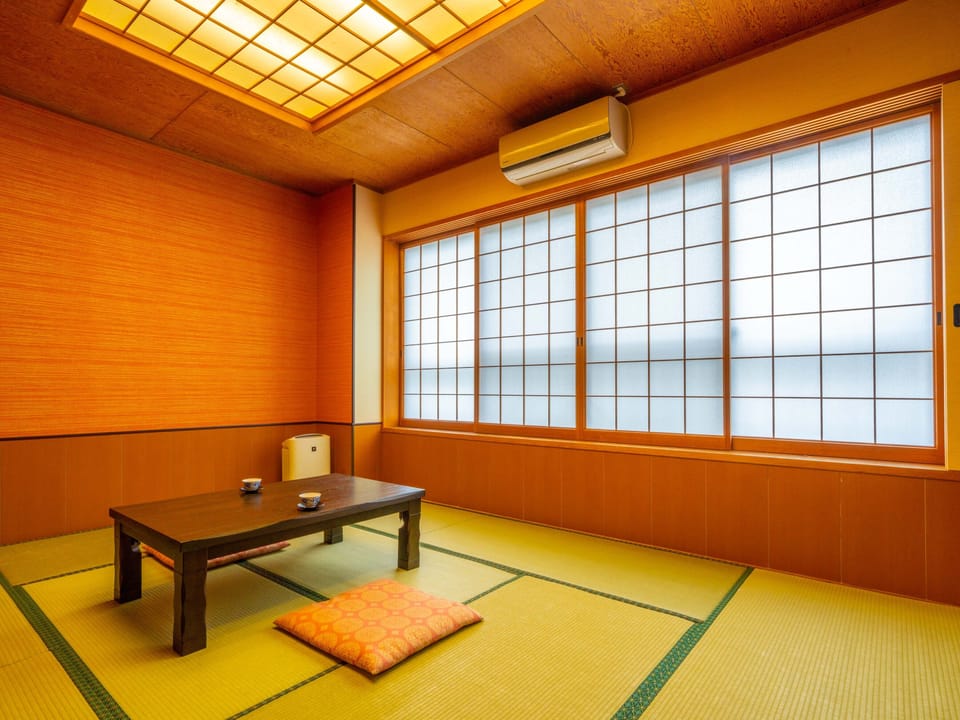 Japanese-Western Style room, 2 Single Beds with Tatami room (27 sqm) | In-room safe, desk, laptop workspace, blackout drapes