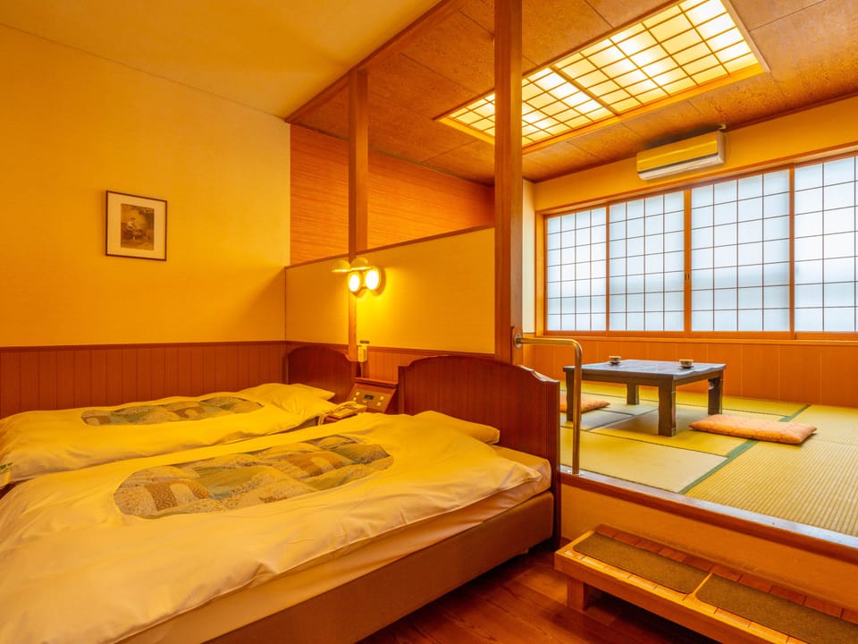Japanese-Western Style room, 2 Single Beds with Tatami room (27 sqm) | In-room safe, desk, laptop workspace, blackout drapes