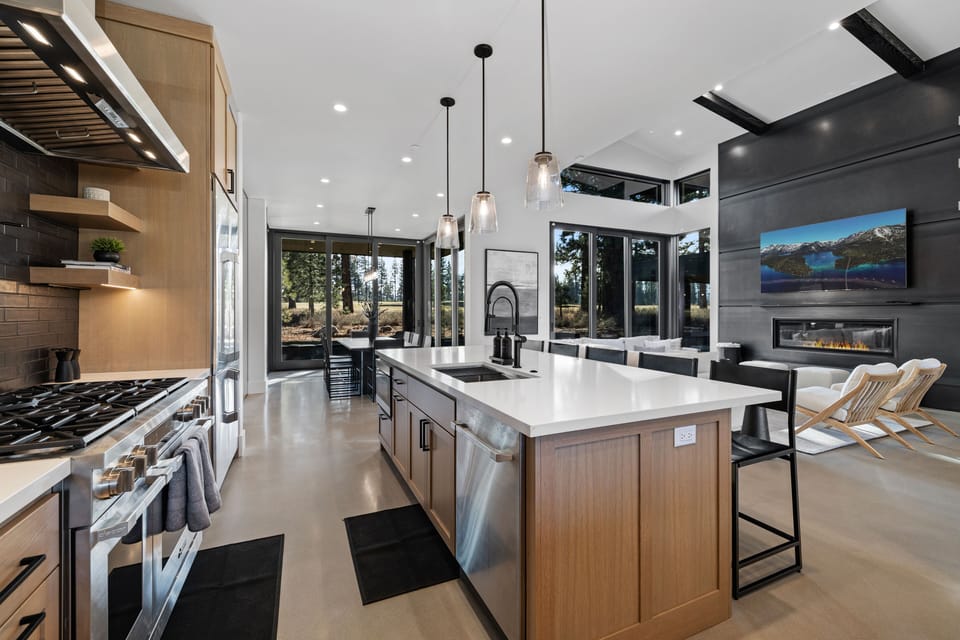 Top of the line kitchen with 8 burner gas stove top and quartz counter tops