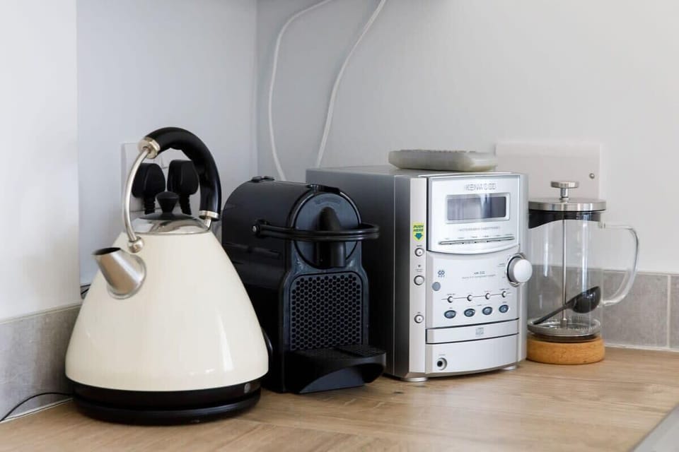 Enjoy your morning cup of tea or coffee with this Nespresso machine.