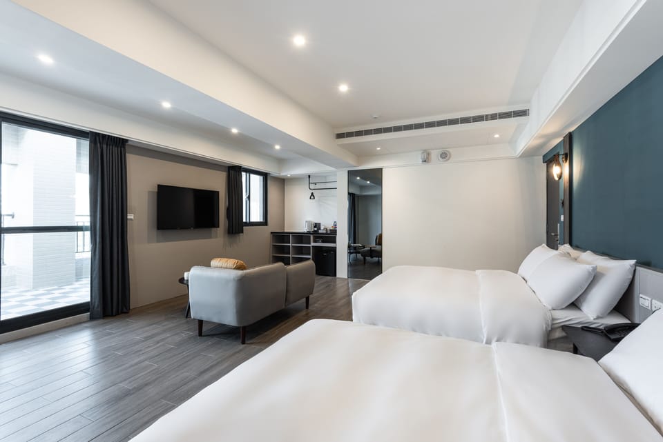Luxury Quadruple Room | Down comforters, free minibar, blackout drapes, soundproofing