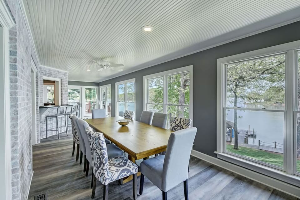 Dining table in the Sun Room - seating for 8-10. Just steps from the kitchen.