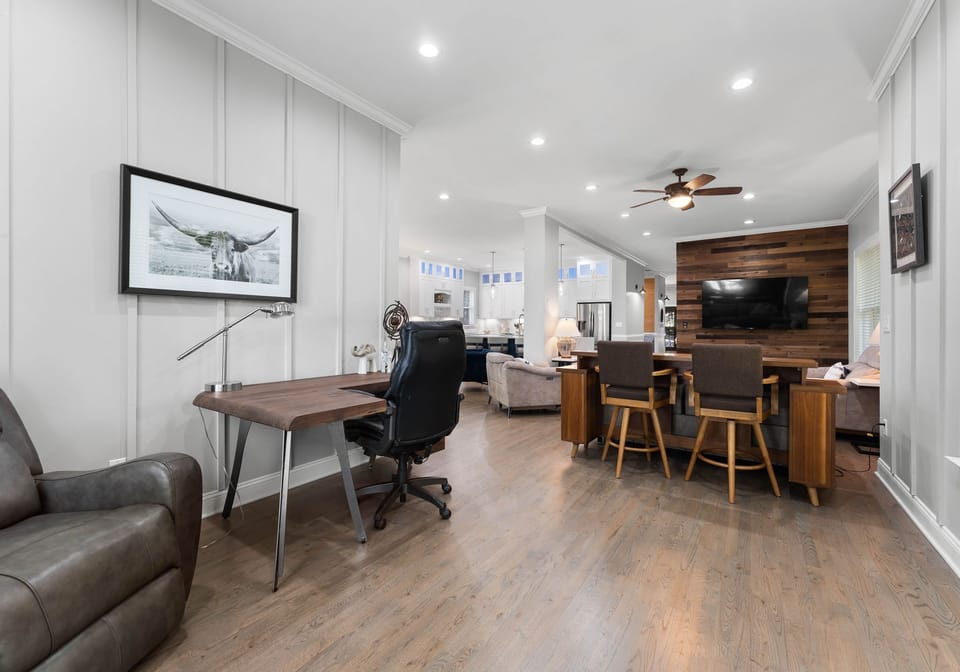 Adjacent to the kitchen, there's an office area.