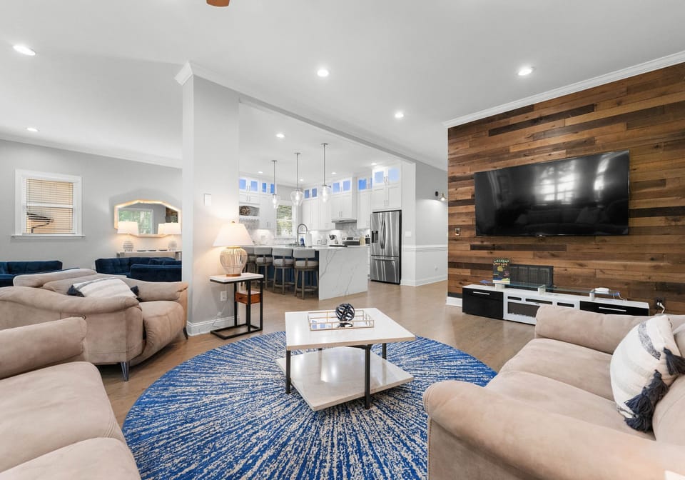 Kick back and watch a movie in the modern open concept main level living. 