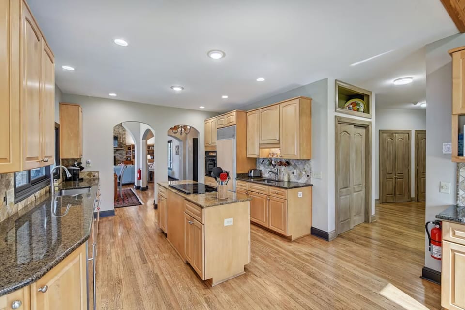 Fully stocked kitchen with a table to seat 6.