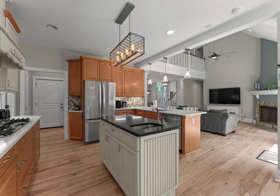 Kitchen adjoining to dining and living room.
