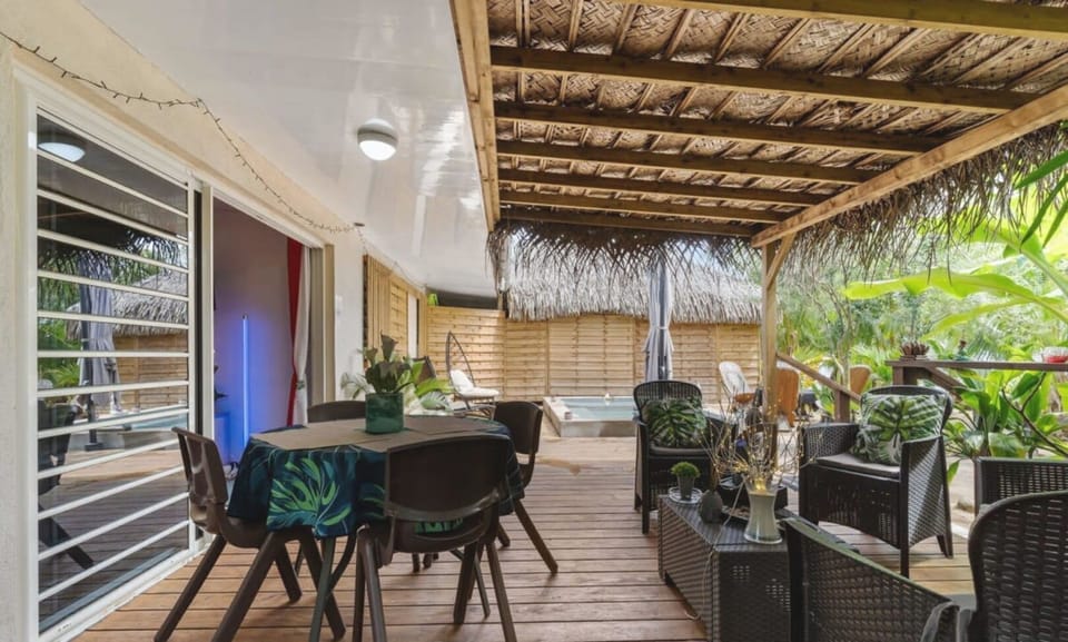 Covered terrace dining and lounge area