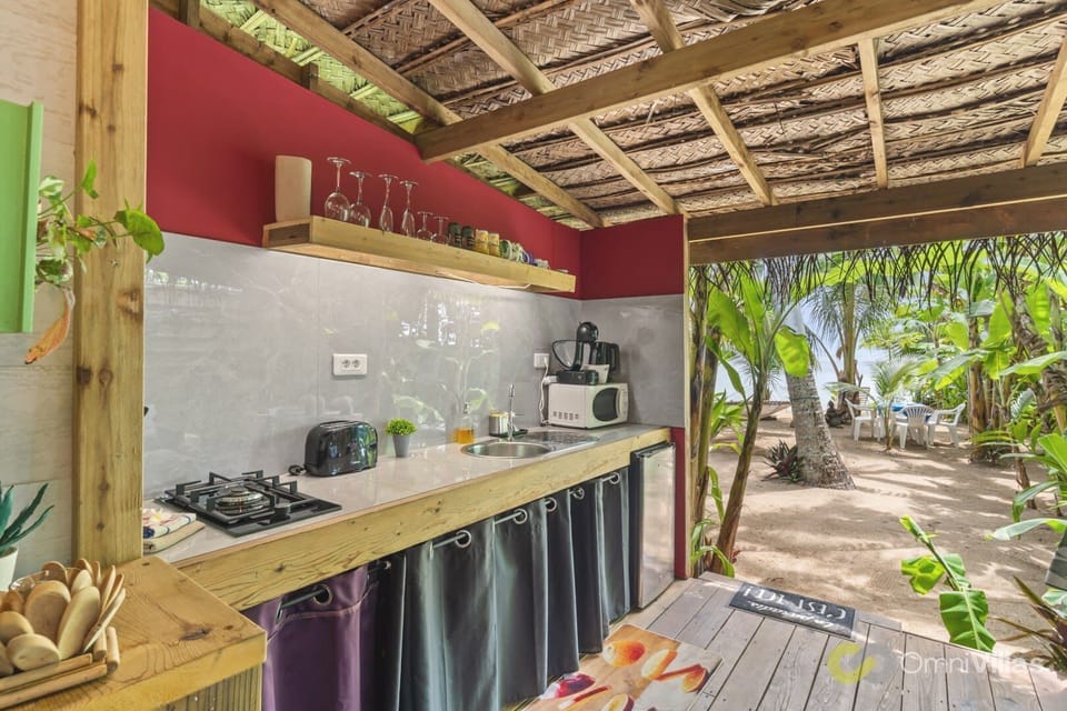 Covered outdoor kitchen.