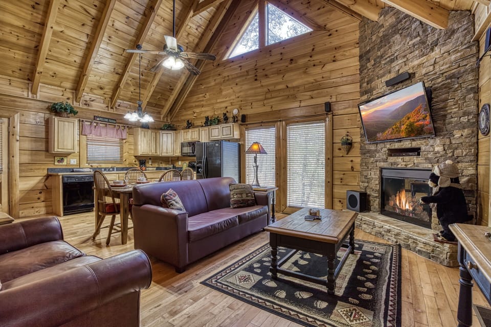 Living room with floor to ceiling electric fireplace
