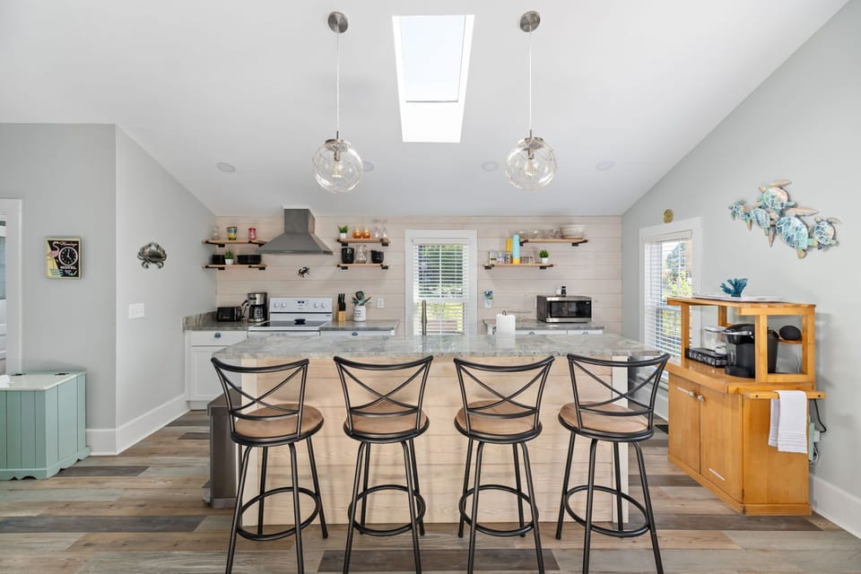 Bar area provides extra seating and open to living room so you are not secluded