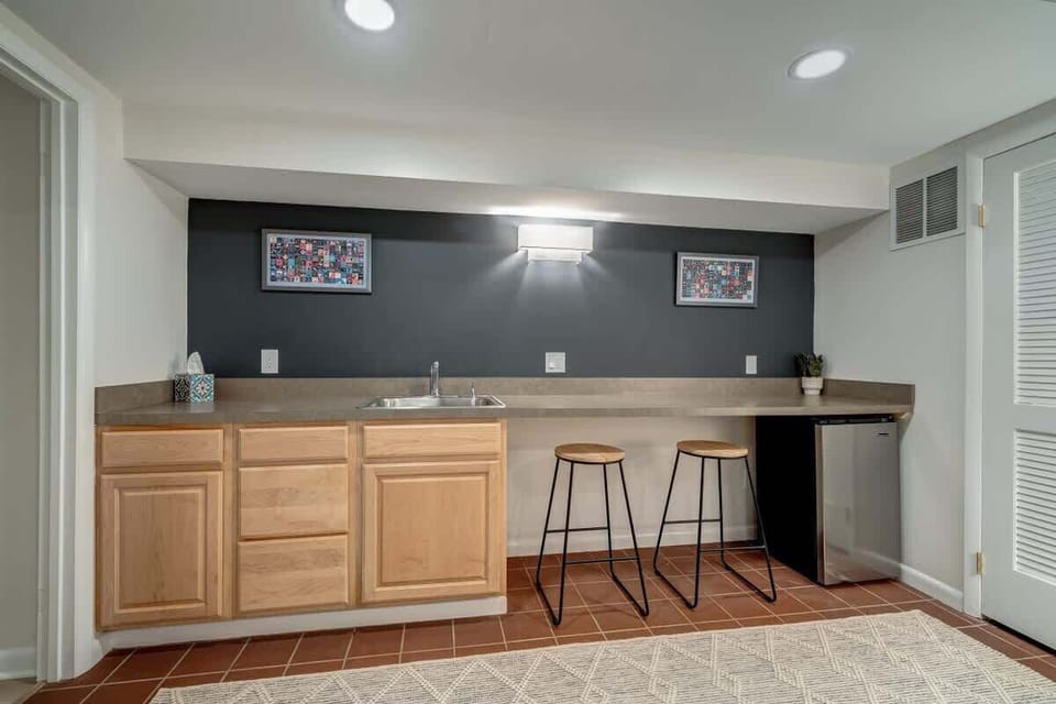 Wet bar in the basement with a mini fridge