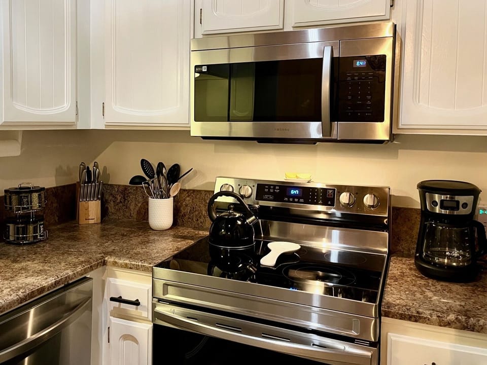 All new stainless steel appliances in kitchen