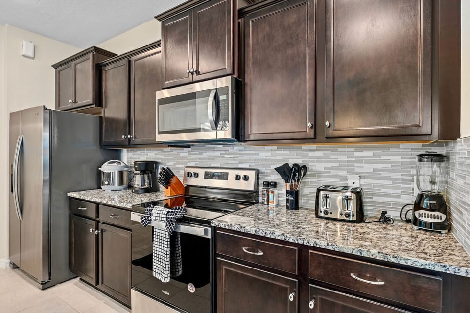 After a long day at the theme parks, unwind by cooking a delicious meal in our fully stocked kitchen. With all the essential appliances and cookware at your fingertips, preparing a home-cooked meal has never been easier.