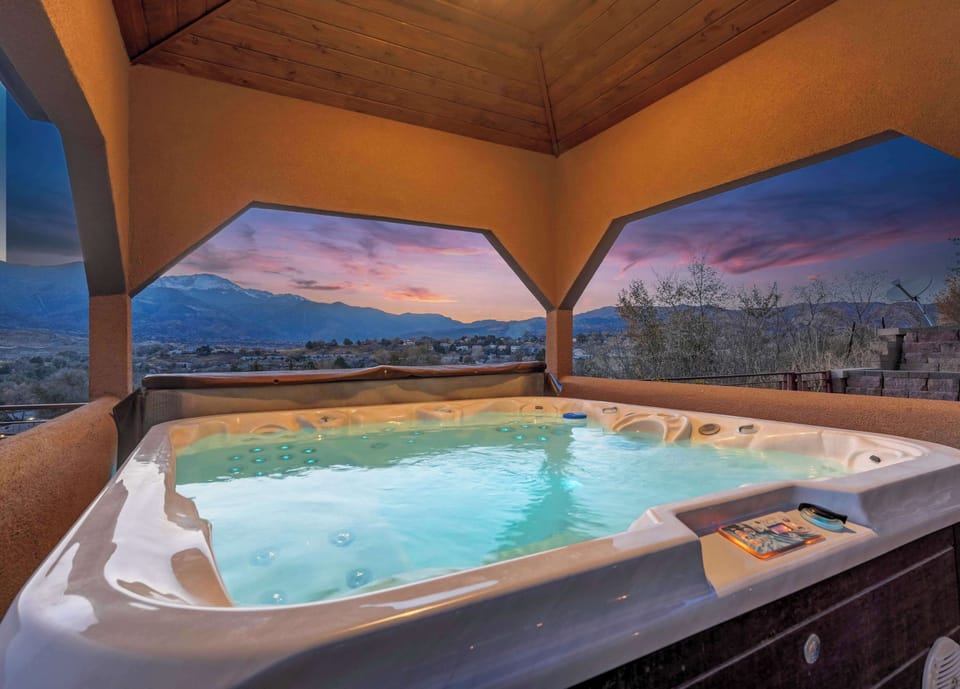 Welcome to Highland Heights! Enjoy the incredible VIEWS of Pikes Peak from the luxurious hot tub!