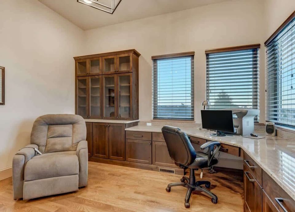 Unwind in our workspace with a plush chair, providing comfort for relaxation after a long workday. Your perfect retreat for both productivity and rejuvenation.