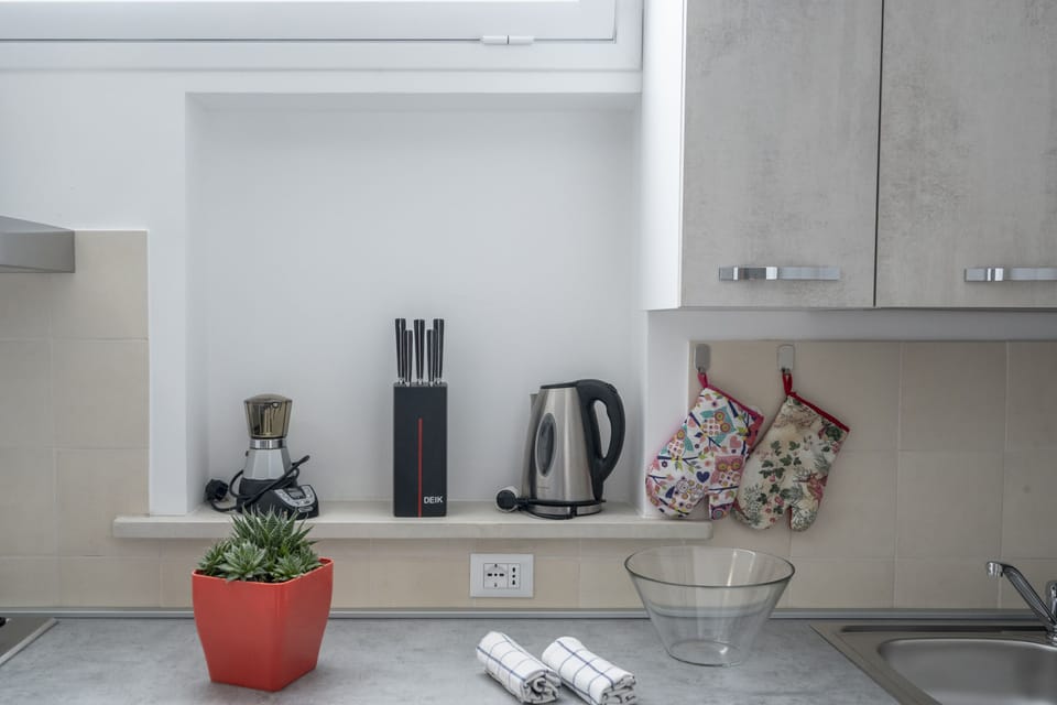 Comfort Apartment | Private kitchen | Full-size fridge, oven, stovetop, electric kettle