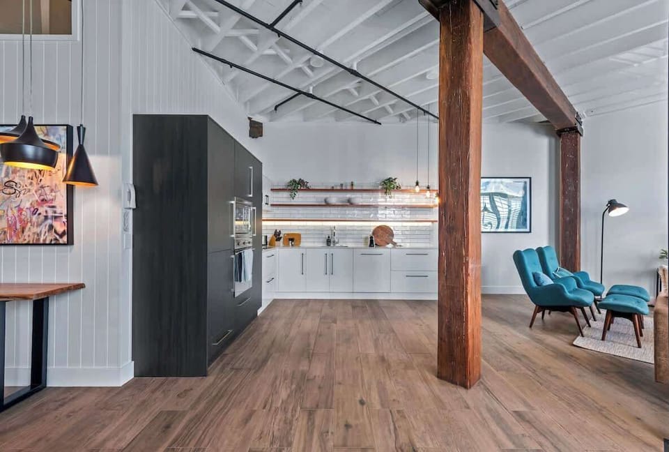 Heigh ceilings,  Exposed wooden beams, Contemporary lighting...