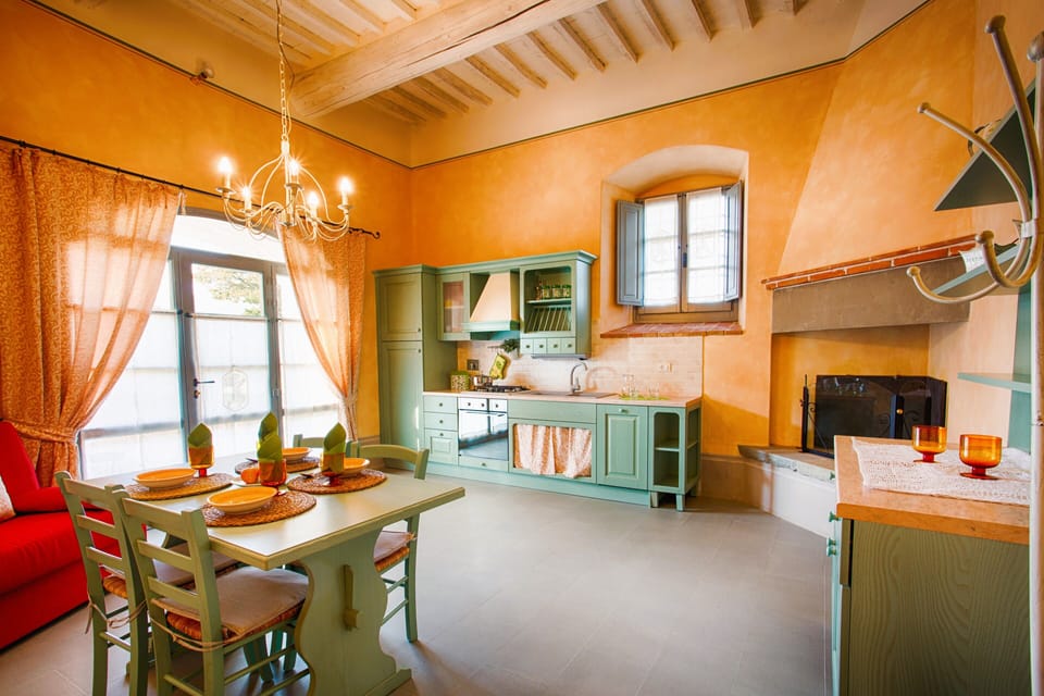 Apartment | Living area | 24-inch flat-screen TV with cable channels, fireplace