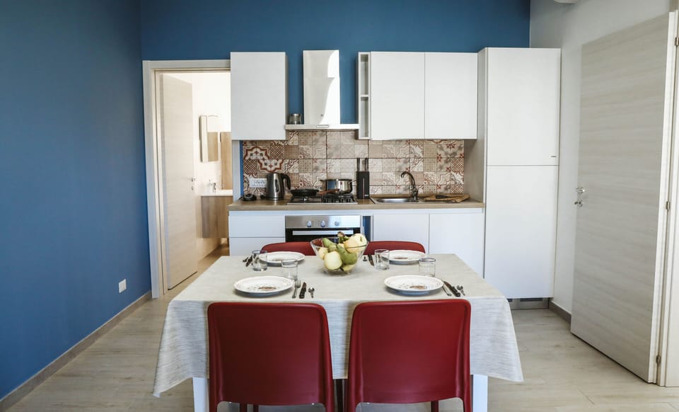 Comfort Apartment | Private kitchen | Full-size fridge, electric kettle, cookware/dishes/utensils